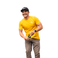 Thumbnail for a man in a yellow shirt white Sol-ti white logo and black hat holding a SuperAde