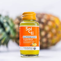 Thumbnail for a bottle of SUPERBOOST SuperShot with a pineapple