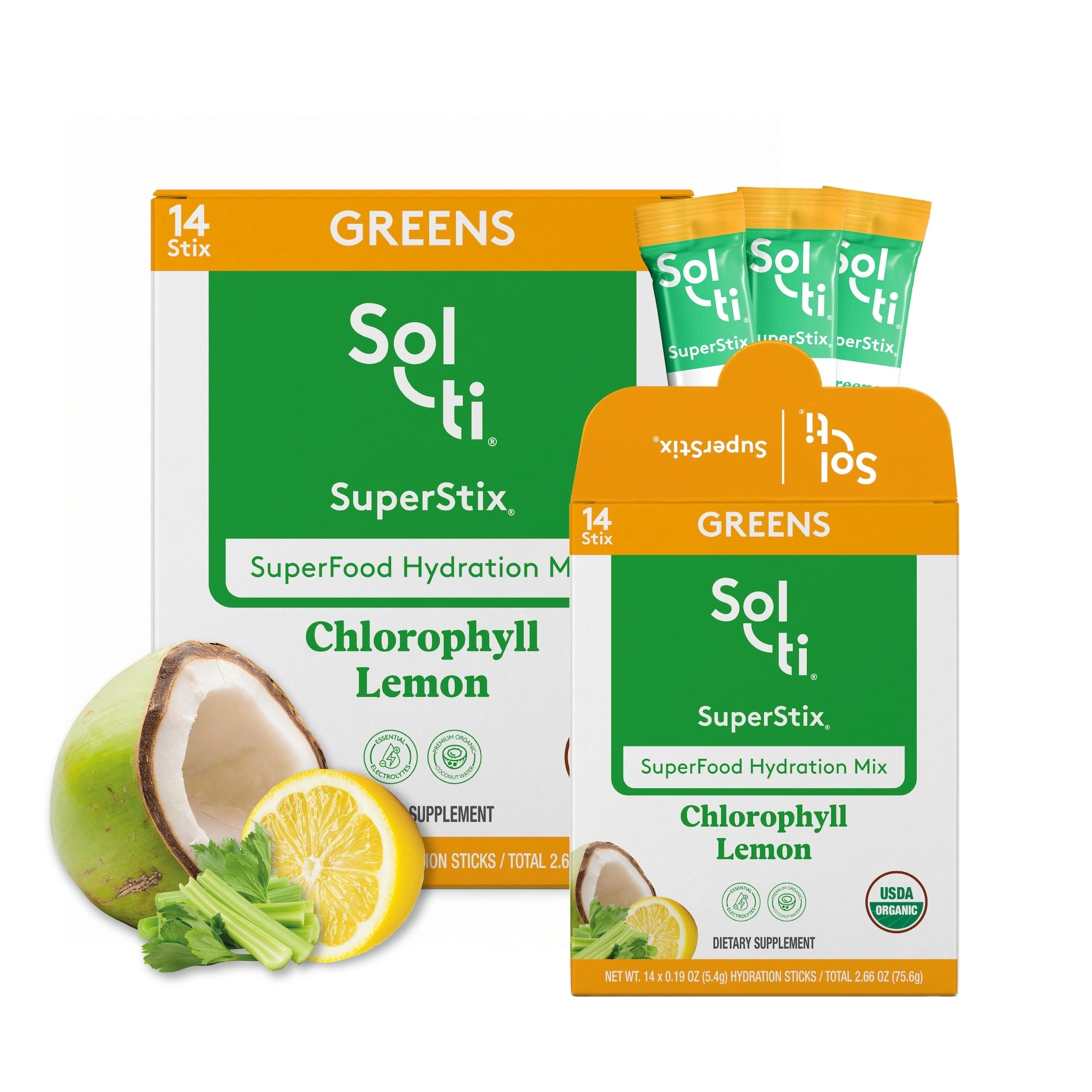 Sol-ti SuperStix Greens Chlorophyll Lemon hydration mix packaging, showing a large box, a smaller front-facing box, three single-serve sticks, and fruit/vegetable props including a halved coconut, sliced lemon, and celery on a white background.