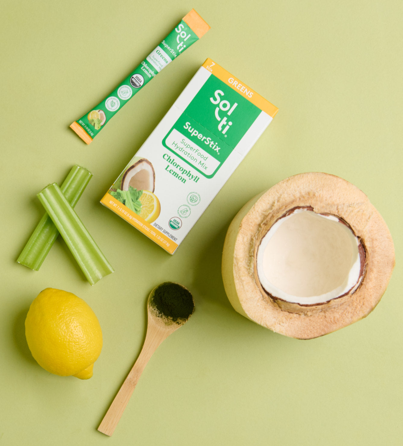 Chlorophyll Lemon SuperStix pack with front label on light green background with celery, young coconut, and lemon slices 